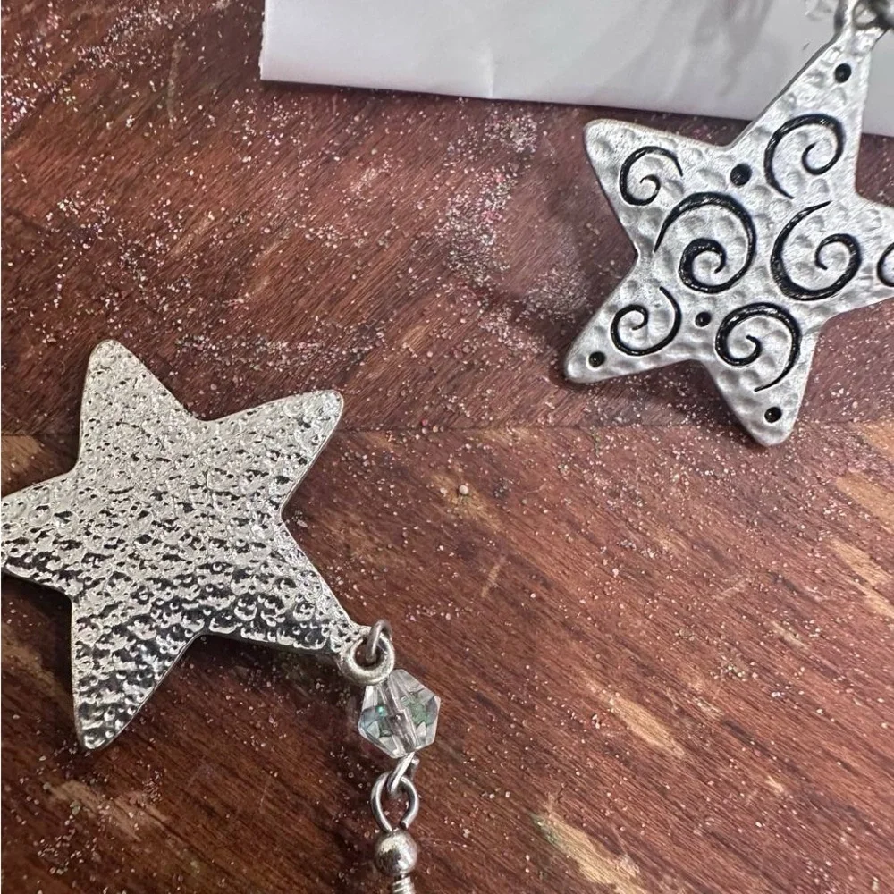 Silver star dangle earrings